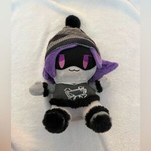 Plush Toy with Purple and Black Hat